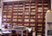 Particolare delle librerie prima dell’intervento di restauro e della realizzazione del finto legno